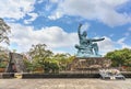 Peace Statue created by Japanese sculptor Seibo Kitamura aside the Orizuru no Tower in Nagasaki peace park.