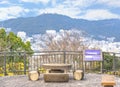 Concrete benches and table carved like a tree trunk on the observation platform of Kazagashira park.