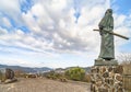 Statue of the samurai Sakamoto RyÃÂma standing on the Kazagashira park overlooking Nagasaki harbor.