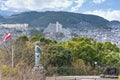 Statue of the samurai Sakamoto RyÃÂma contemplating the hills of Nagasaki from the observatory of Kazagashira park.