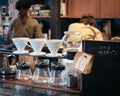 Nagoya, Aichi, Japan - Kannon coffee in Osu. Barista and tools for pour over coffee on table.