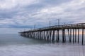 Nags Head Fishing Pier under Stormy Clouds Royalty Free Stock Photo