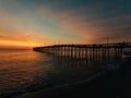 Nags Head Pier at sunrise, in the Outer Banks, North Carolina Royalty Free Stock Photo