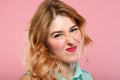 Nah unimpressed girl grimacing wrinkling nose Royalty Free Stock Photo