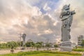 Sunrise on the  giant stone dragon head of the pillars that greet cruise ship visitors close to the Naha Port Cruise Terminal dock Royalty Free Stock Photo