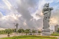 Sunrise on the giant stone dragon head of the pillars that greet cruise ship visitors close to the Naha Port Cruise Terminal dock