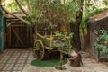 The cart is in the lower yard on exhibition in the Gardens Almona collection, in the rays of the setting sun, in the Druze village