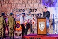 A representative from the army lays a wreath at the memorial at a commemorative ceremony in the Memorial Site To the Fallen in Isr