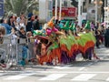 Participants in a Chinese dragon costume in the carnival of Adloyada in Nahariyya, Israel Royalty Free Stock Photo