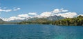 Nahuel Huapi lake, San Carlos de Bariloche Argentina. Waves on the lake. Mountains with fresh snow surrounding the lake Royalty Free Stock Photo