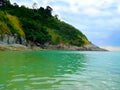 Nai Yang beach in Thailand in the Gulf of the Indian ocean, among the mountains, which grow palm trees and tropical