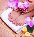 Nail care. French Manicure on Female Feet and Hands Royalty Free Stock Photo