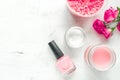 Nail care spa set with rose polish, cream white background top view mock-up Royalty Free Stock Photo