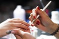 Nail manicure and polish in progress Royalty Free Stock Photo