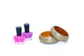 Nail polish bottles and wooden bangles Royalty Free Stock Photo
