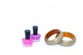 Nail polish bottles and wooden bangles Royalty Free Stock Photo