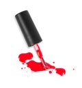 Nail polish brush with red puddles close-up on white background Royalty Free Stock Photo