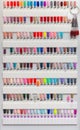 Nail polish samples of different bright colors on a white background