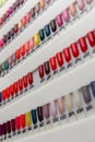 Nail polish samples of different bright colors on a white background