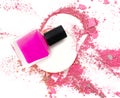 Nail polishing and broken multicolor make up powder.