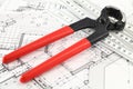 Nail puller, ruler & architectural plan Royalty Free Stock Photo