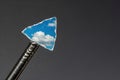 A nail with a tip in the form of a sky with clouds. Royalty Free Stock Photo