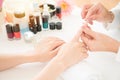 Nail treatment manicurist polishing