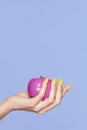 Nails Design. Female Hands With Colorful Nails Holding Apple