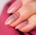 Nails Design. Hands With Bright Nude Manicure On Grey Background. Close Up Of Female Hands. Art Nail