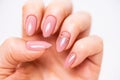 Nails Design. Hands With Bright Nude Manicure On Grey Background. Close Up Of Female Hands. Art Nail