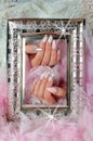 Nails pink and pearl with diamonds with ancient finely decorated Royalty Free Stock Photo