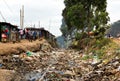 Nairobi, Kenya - August, 2019: Kibera slum in Nairobi with railroad and lots of garbage. Kibera is the biggest slum in Africa.