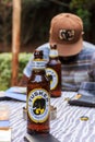 Nairobi, Kenya, July 11 2017 - Tourist enjoys the local beer Tusker