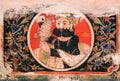 Naive portrait of indian man eating fruit, fresco of the old house in Shekhawati region