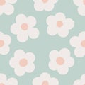 Naive seamless floral boho pattern with white daisies on a light green background