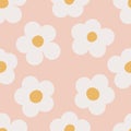 Naive seamless floral boho pattern with white daisies on a peach background