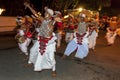 Naiyandi Dancers and drummers perform at the commencement of the Esala Perahera in Kandy, Sri Lanka.