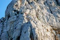 Mountain climbers climb the rocks of the National Parc des Calanques at Calanque Port Pin between Marseille and Cassis, Bouches-du Royalty Free Stock Photo