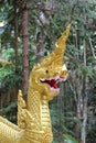 Naka statue at staircase in Thai temple