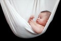 Baby sleeping in White Hammock Sling Royalty Free Stock Photo