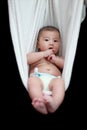 Baby in White Hammock Sling Royalty Free Stock Photo