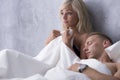 Naked man and woman in bed Royalty Free Stock Photo