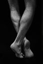 Naked muscular male legs on a black background Royalty Free Stock Photo