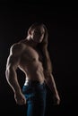 Naked torso male bodybuilder athlete with long blond hair in studio Royalty Free Stock Photo