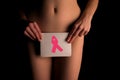 naked woman shows pink cancer awarness symbol Royalty Free Stock Photo