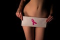 naked woman shows pink cancer awarness symbol Royalty Free Stock Photo