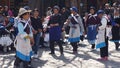 Nakhi women dance around the square in Lijiang Royalty Free Stock Photo