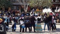 Nakhi women dance around the square in Lijiang Royalty Free Stock Photo