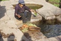 Nakhi women is farming in Lijiang Royalty Free Stock Photo