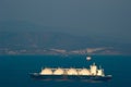 Nakhodka. Russia -April 05, 2016: LNG carrier Grand Elena at sunset on the roads of the port of Nakhodka.